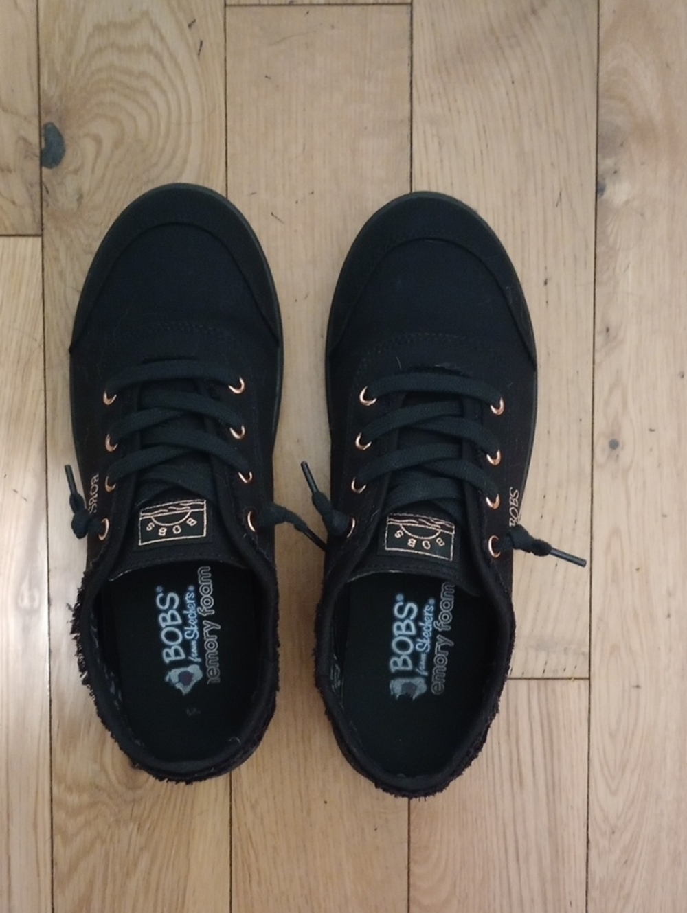 Bobs From Sketchers Black Canvas Shoe. Gold Eyelets.